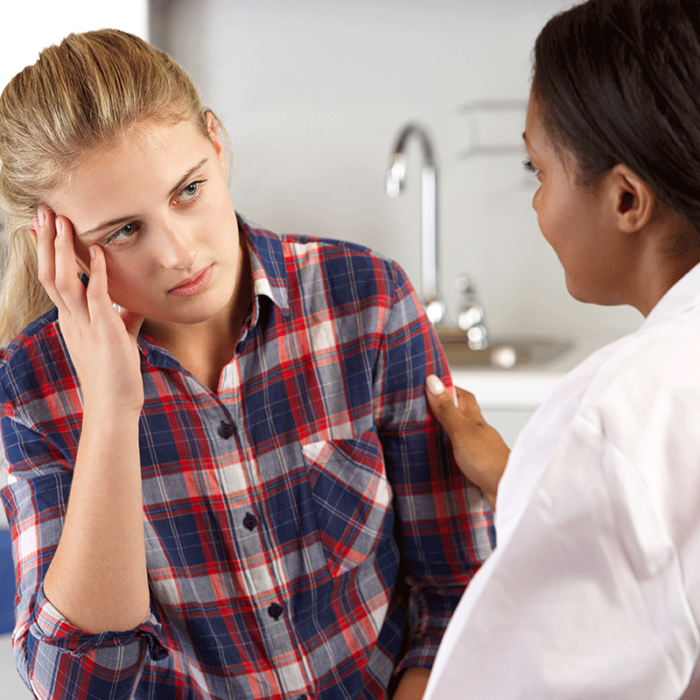 a teen talks to a doctor about teen co-occurring disorders