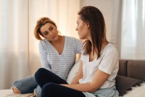 two people talk about family therapy