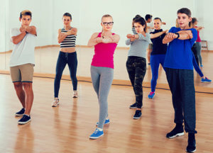 A group of teens participate in dance movement therapy in Los Angeles CA
