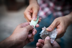 Teens exchanging drugs who are in need of a synthetic drug addiction treatment program