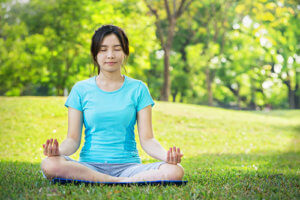 A teen girl does yoga therapy in Los Angeles CA